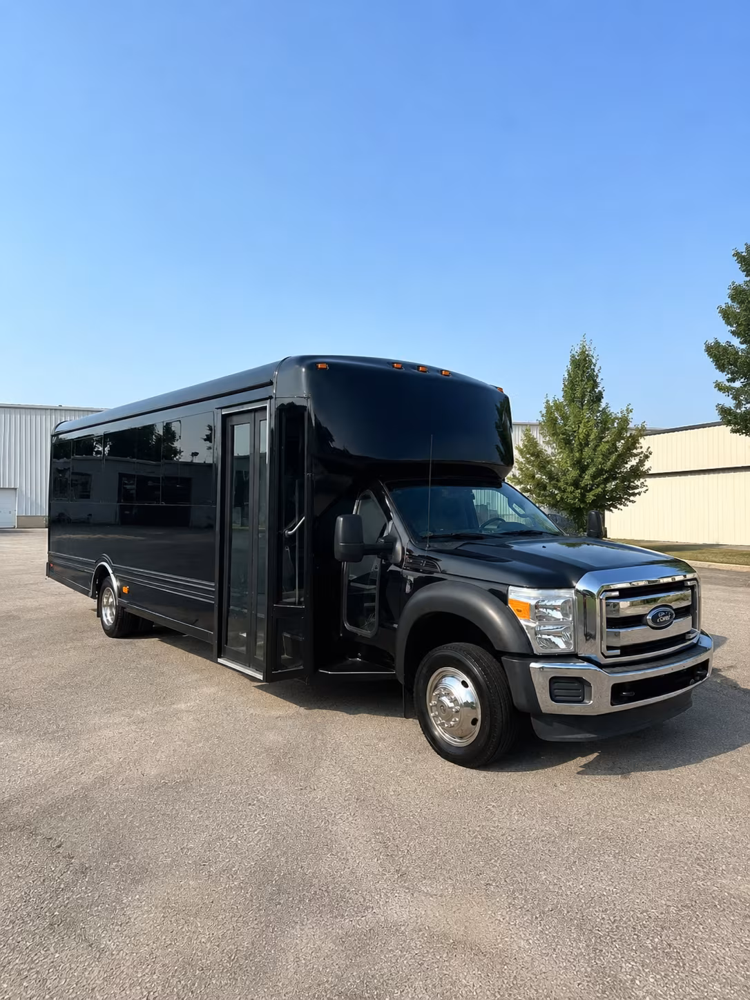 bus rentals for corporate retreats near peoria and the west valley